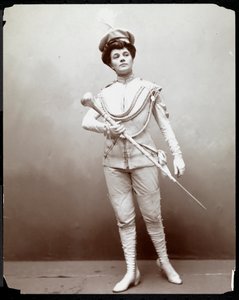 A woman modeling a band uniform, holding a baton